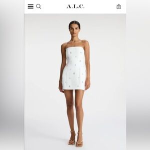 Bridal mini dress worn once for a couple hrs. Great for second dress at wedding.